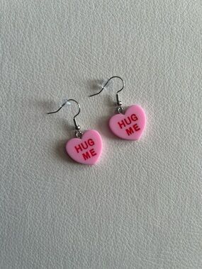 Conversation Hearts HUG ME Drop Earrings in Pink with Red Lettering